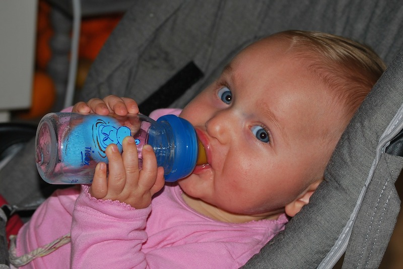 Baby drinking from a bottle