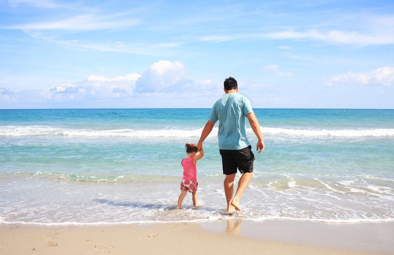 Father and daughter at the beach