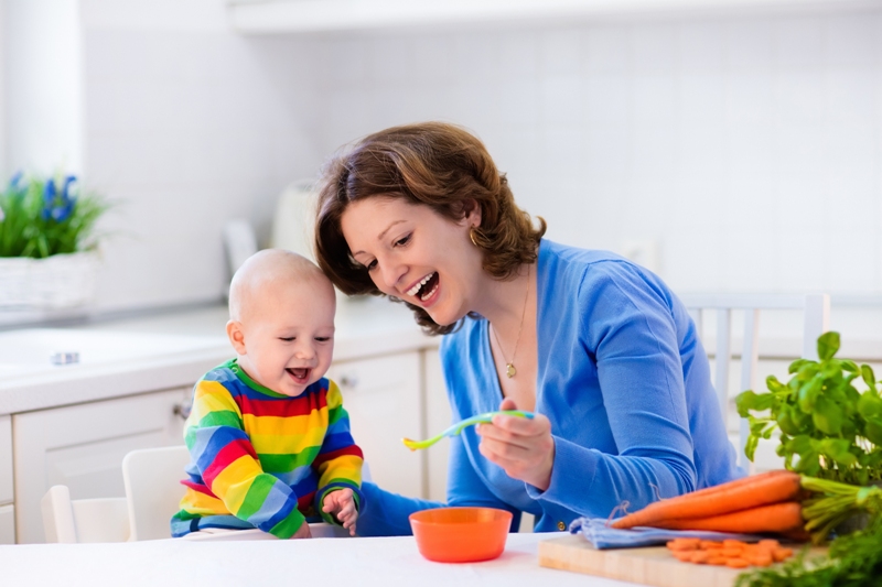 Mom feeding her baby