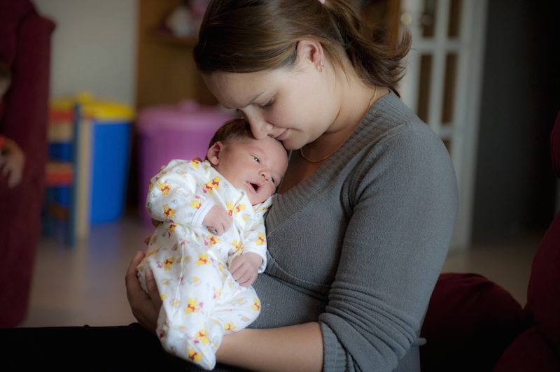 Happy mom with her baby